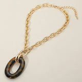 Oval Ring Pendant: Brn